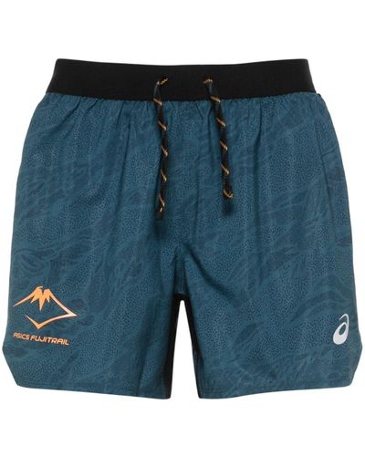 Asics Pantalones cortos de deporte Fujitrail con logo estampado - Azul
