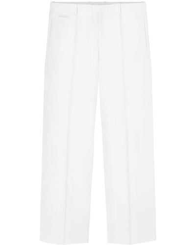Versace Pantalon de costume en cuir grainé - Blanc
