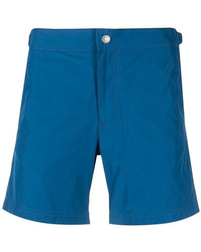 Alexander McQueen Pantalones cortos con franja logo - Azul