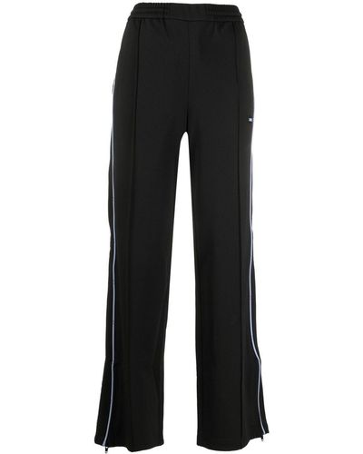 McQ Pantalones de chándal con parche del logo - Negro