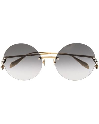 Alexander McQueen Sonnenbrille mit rundem Gestell - Braun