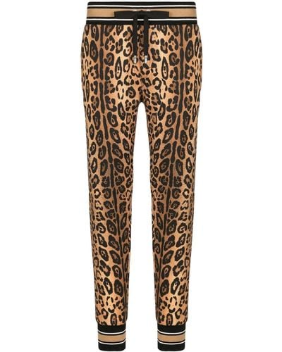 Dolce & Gabbana Pantalones de chándal con estampado de leopardo - Neutro