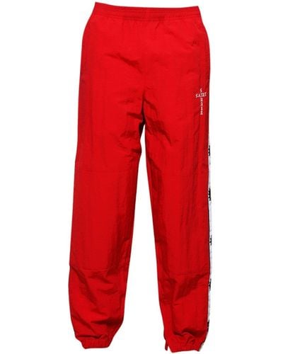 SAINT Mxxxxxx Logo-tape Track Trousers - Red