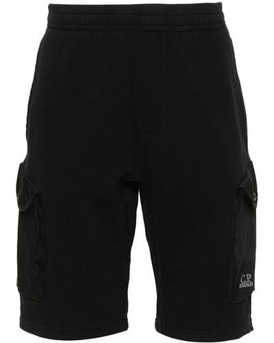 C.P. Company Pantalones cortos de deporte con logo bordado - Negro