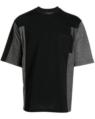 White Mountaineering Camiseta con paneles colour block - Negro