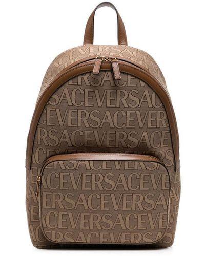 Versace Allover Logo-jacquard Backpack - Brown