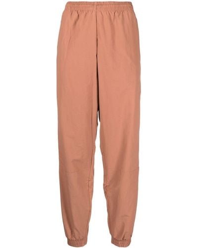 adidas Pantalones de chándal con rayas laterales - Marrón