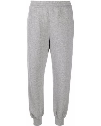 Alexander McQueen Pantalones de chándal con logo - Gris