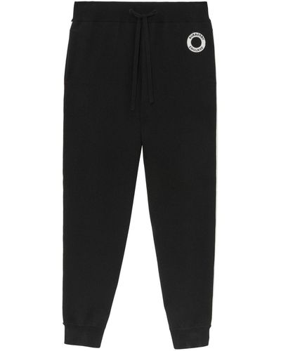 Burberry Pantalon de jogging à applique Logo Graphic - Noir
