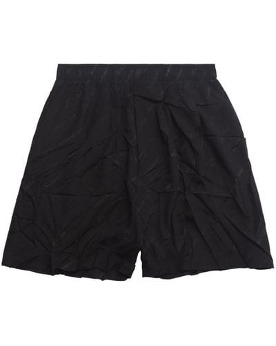 Balenciaga Shorts aus Seide mit Logo-Print - Schwarz