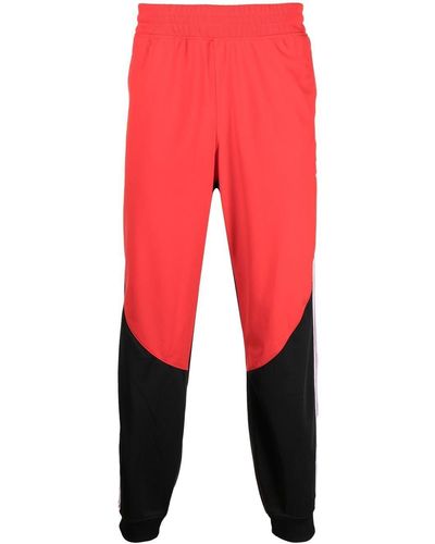 adidas Jogginghose in Colour-Block-Optik - Rot