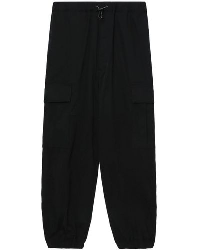 Comme des Garçons Pantaloni sportivi in stile cargo - Nero