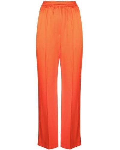 Nanushka Pantalon ample en satin - Orange
