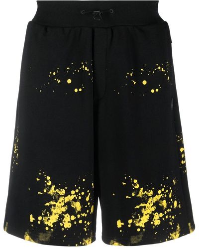 Philipp Plein Short à effet taches de peinture - Noir