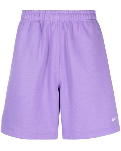 Nike Short de sport à logo imprimé - Violet