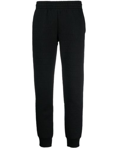 Moschino Flocked-logo Elasticated-waist Track Trousers - Black