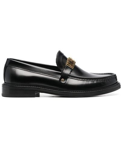 Moschino Mocasines con logo en relieve - Negro