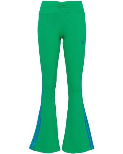adidas Ausgestellte Hose mit Streifen - Grün