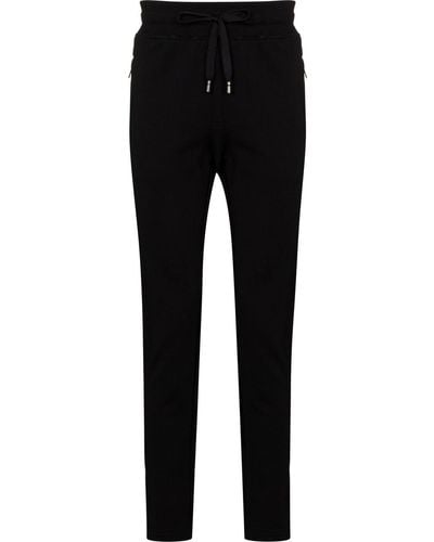 Dolce & Gabbana Pantalon de jogging à plaque logo - Noir