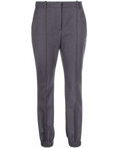 Alexander McQueen Pantalon de tailleur à plis marqués - Gris