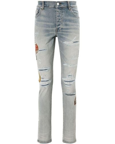 Amiri Travel Patch Repair Skinny-Jeans - Blau