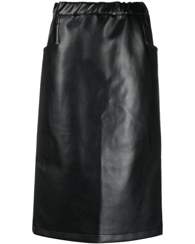 COMME DES GARÇON BLACK Jupe en cuir artificiel à taille haute - Noir