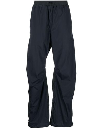 Reebok Pantalones livianos a paneles - Azul