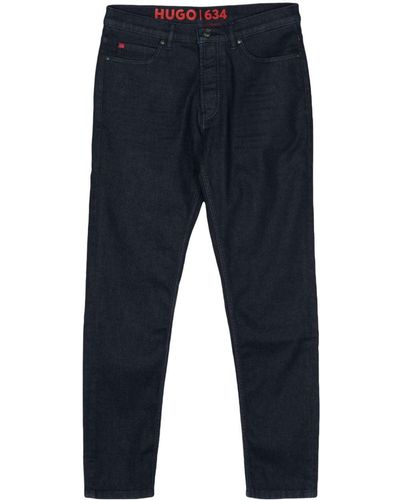 HUGO Pantalones ajustados con placa del logo - Azul
