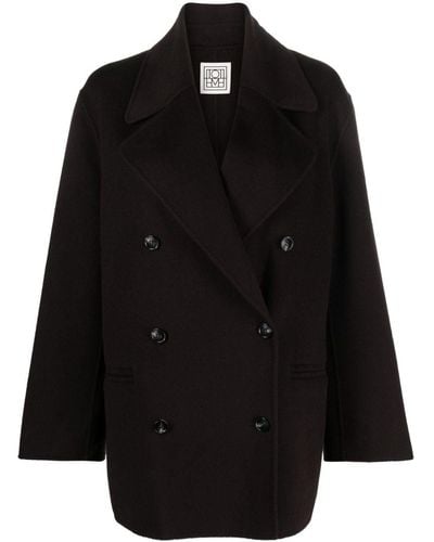Totême Manteau en laine à boutonnière croisée - Noir