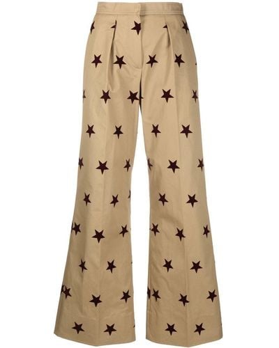 Palm Angels Pantalones de vestir anchos con estrella estampada - Neutro