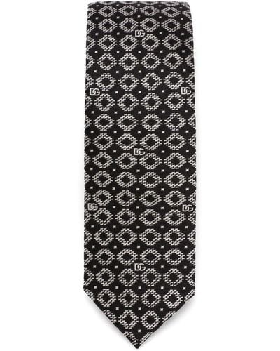 Dolce & Gabbana Cravate en soie à logo jacquard - Noir