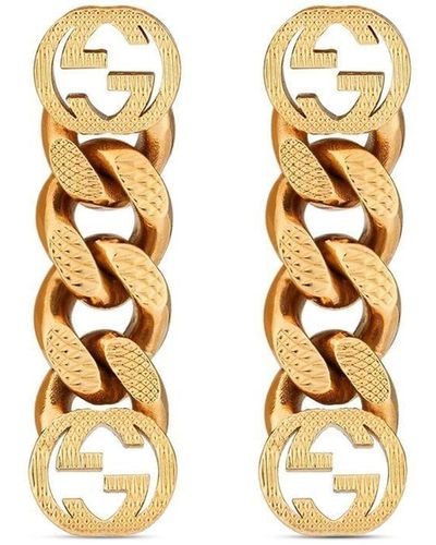 Gucci Boucles d'oreilles pendantes à logo GG - Métallisé