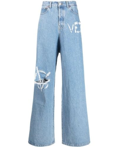 Vetements Logo-distressed baggy Jeans - Blue