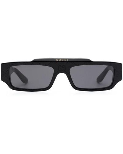 Gucci Lunettes de soleil rectangulaires à imprimé GG - Noir