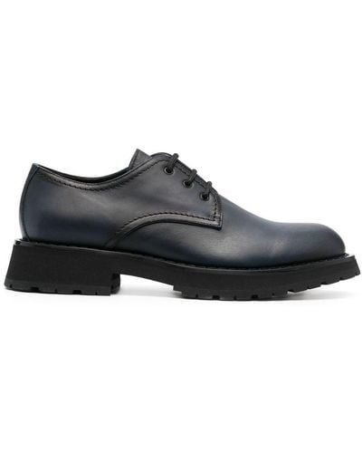 Alexander McQueen Zapatos derby con suela gruesa - Negro
