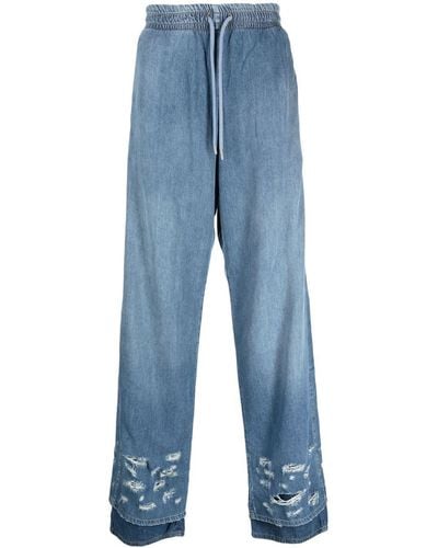 DIESEL Jeans a gamba ampia con effetto vissuto - Blu