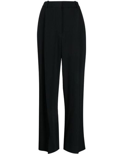 Victoria Beckham Pantalon ample à design plissé - Noir
