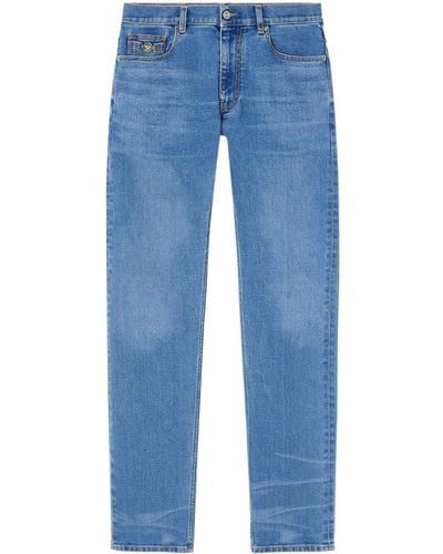 Versace Medusa Head-embellished Mid-rise Slim-fit Jeans - Blue