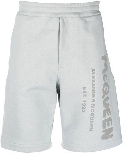 Alexander McQueen Short de sport en coton à logo imprimé - Gris