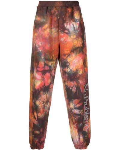 Aries Pantalon de jogging à imprimé tie-dye - Orange