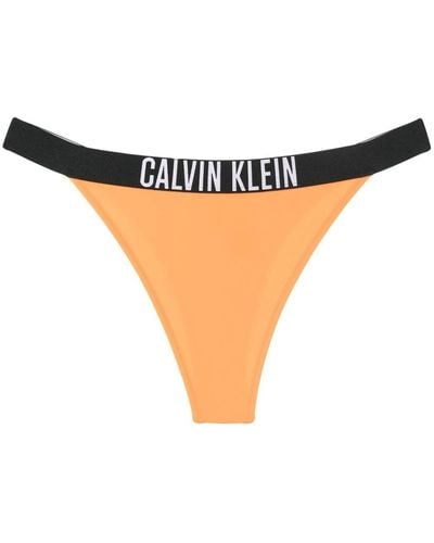 Calvin Klein Bragas de bikini con logo en la cinturilla - Naranja