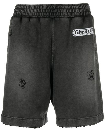 Givenchy Pantalones cortos de deporte con llamas estampadas - Negro