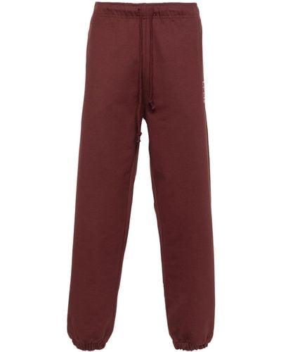 Rassvet (PACCBET) Pantalones de chándal con logo bordado - Rojo