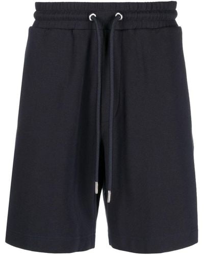 Moncler Pantalones cortos de chándal con rayas del logo - Azul