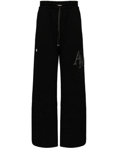 Amiri Pantalones de chándal con logo bordado - Negro