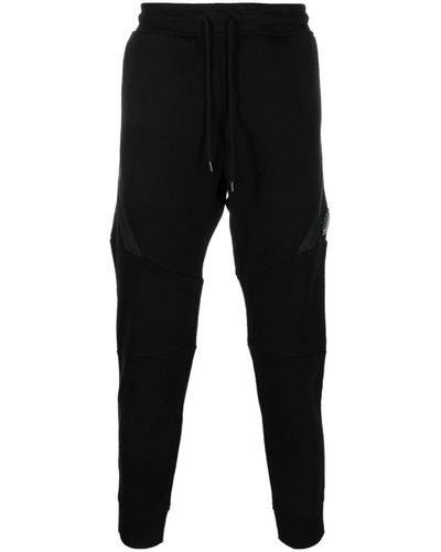 C.P. Company Pantalon de jogging en coton à détail de lentille - Noir