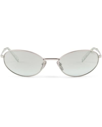 Prada Lunettes de soleil à monture ovale - Gris