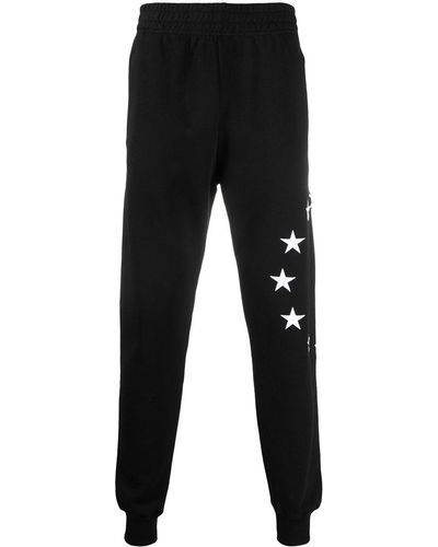 Etudes Studio Pantalones de chándal con estrella bordada - Negro