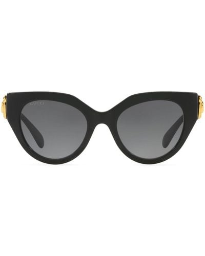 Gucci Gafas de sol cat eye con placa del logo - Negro