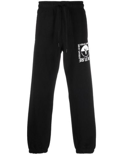 Versace Jeans Couture Pantalon de jogging à logo imprimé - Noir